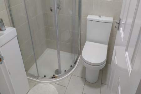 Image of plumbing in a shower installation.
